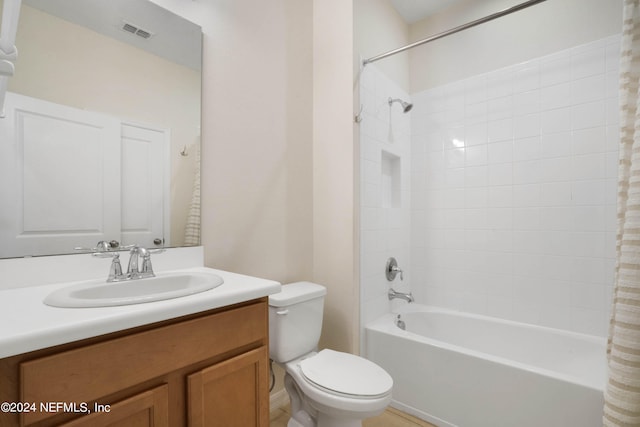 full bathroom with toilet, vanity with extensive cabinet space, and shower / tub combo with curtain