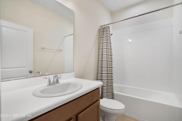 full bathroom with tile floors, toilet, shower / bathtub combination with curtain, and vanity