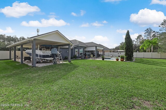 exterior space with a swimming pool and a patio