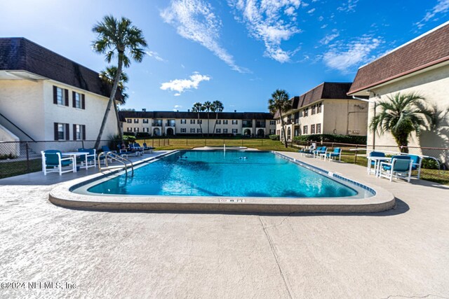 1530 El Prado Rd Unit 5, Jacksonville, FL 32216 - view of pool with a patio