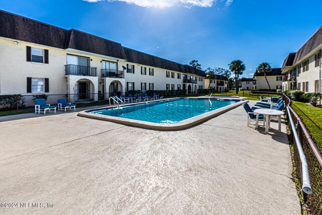 1530 El Prado Rd Unit 5, Jacksonville, FL 32216 - view of pool with a patio area