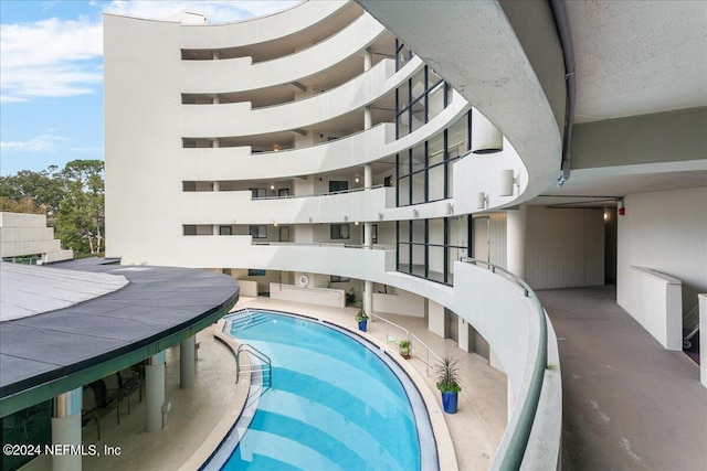 view of pool with a patio area