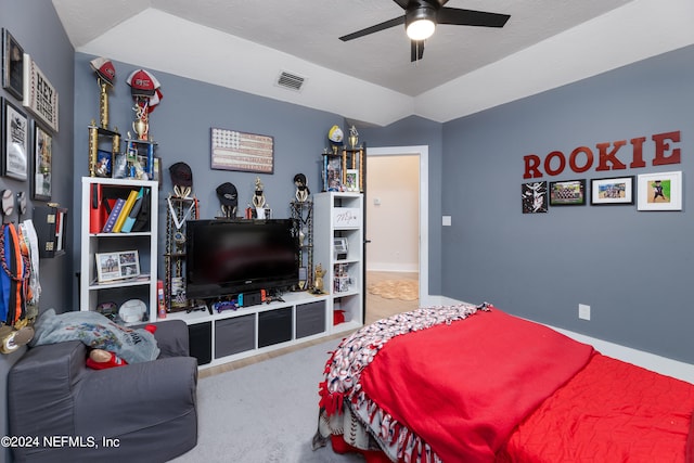 carpeted bedroom with ceiling fan