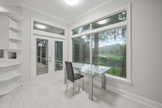 interior space with built in features, ornamental molding, and a textured ceiling