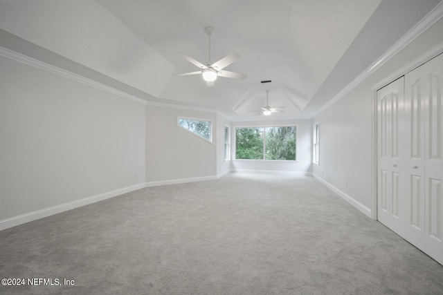 spare room with ceiling fan, carpet floors, and ornamental molding