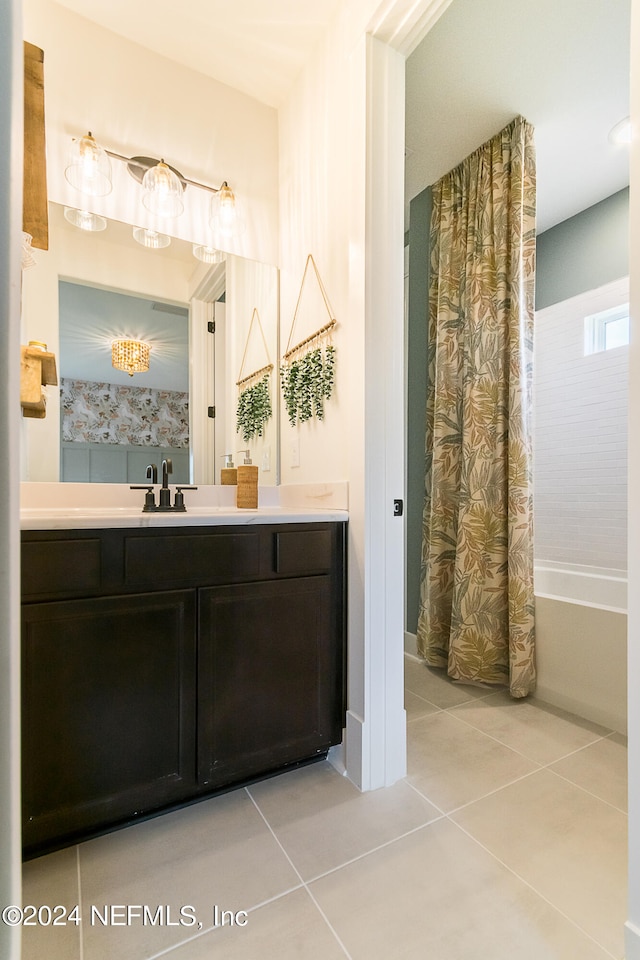 bathroom featuring vanity, tile patterned floors, and shower / bath combination with curtain