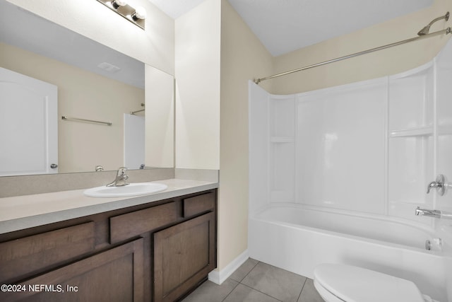 full bathroom with toilet, washtub / shower combination, tile floors, and vanity