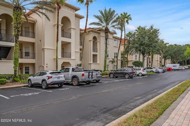 13846 Atlantic Blvd Unit 902, Jacksonville, FL 32225 - view of building exterior featuring uncovered parking