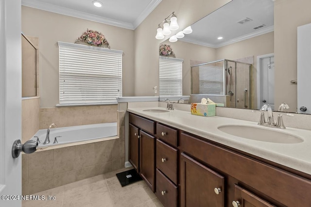 bathroom with plus walk in shower, plenty of natural light, dual sinks, tile flooring, and oversized vanity