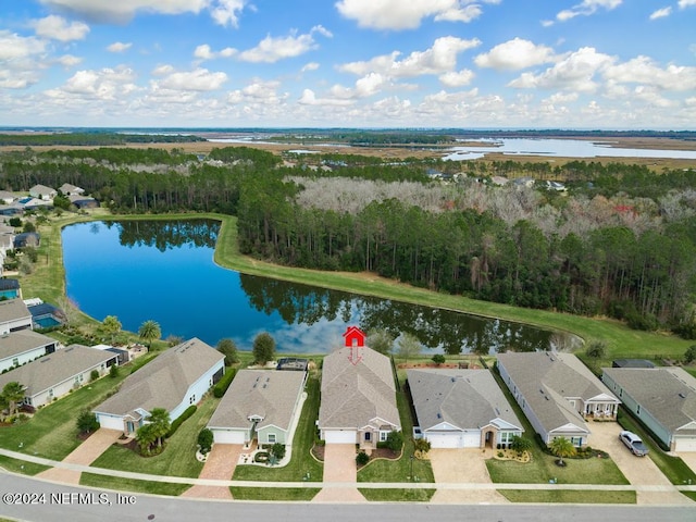 birds eye view of property with a water view