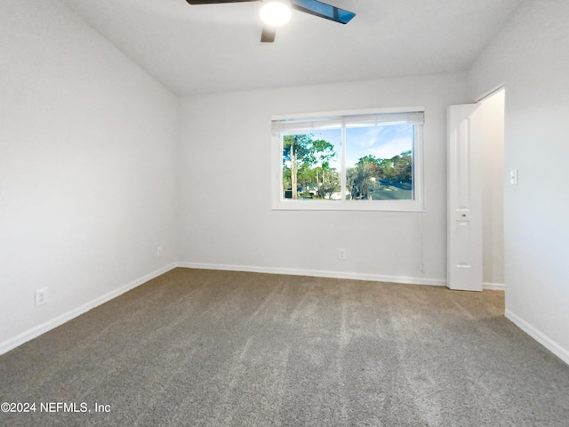 unfurnished room with light carpet and ceiling fan