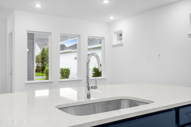 kitchen featuring sink and a wealth of natural light