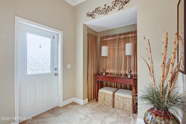 entryway with crown molding