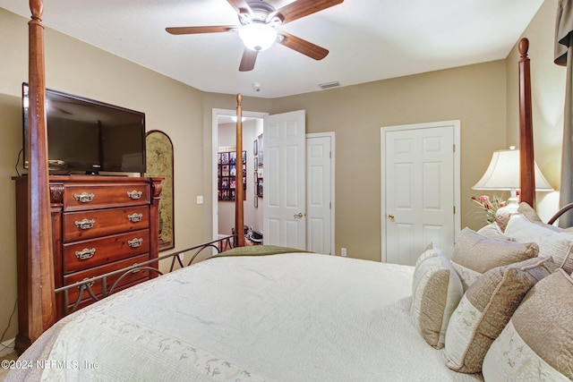 bedroom featuring visible vents and a ceiling fan