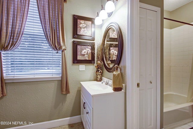 bathroom featuring vanity and shower / bathtub combination