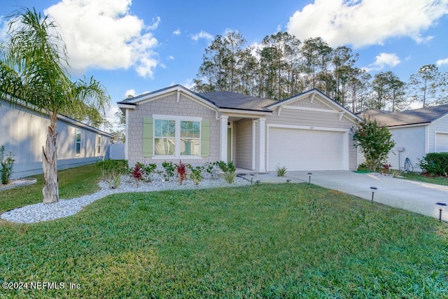 ranch-style home featuring a front yard and a garage