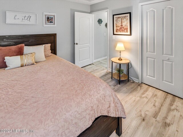 bedroom featuring light hardwood / wood-style flooring