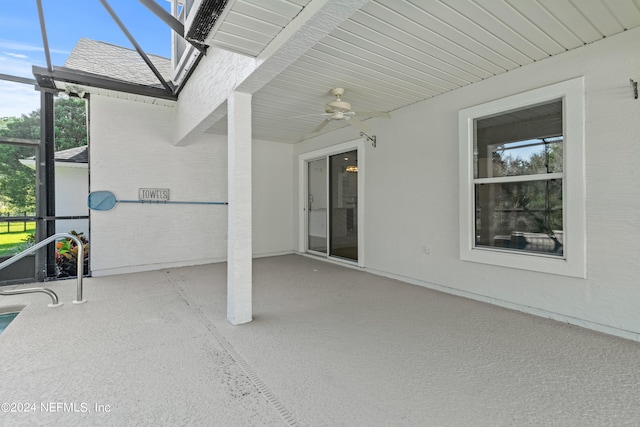 view of patio / terrace with a lanai and ceiling fan