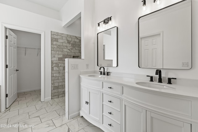 bathroom with vanity and walk in shower