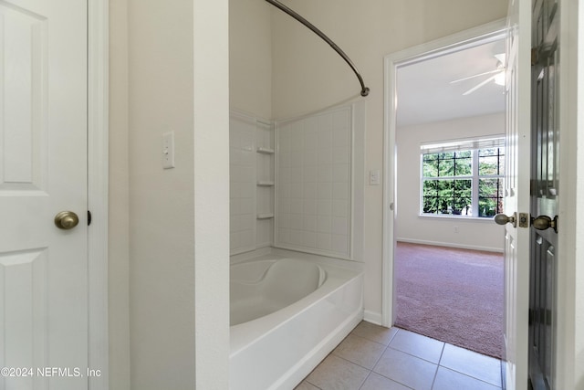 bathroom featuring tile patterned flooring, ceiling fan, and bathing tub / shower combination