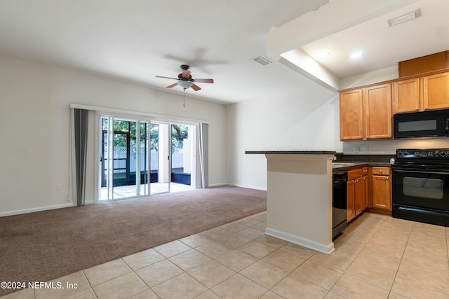 kitchen with light carpet, kitchen peninsula, ceiling fan, and black appliances