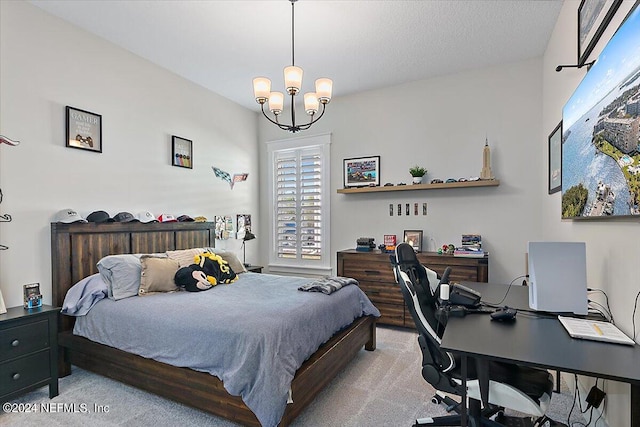 carpeted bedroom featuring a chandelier