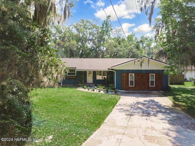 ranch-style house with a front yard