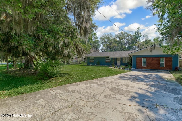 ranch-style house with a front yard