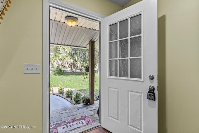 doorway featuring hardwood / wood-style floors