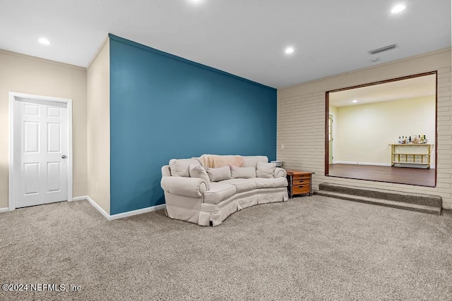 carpeted living room with crown molding