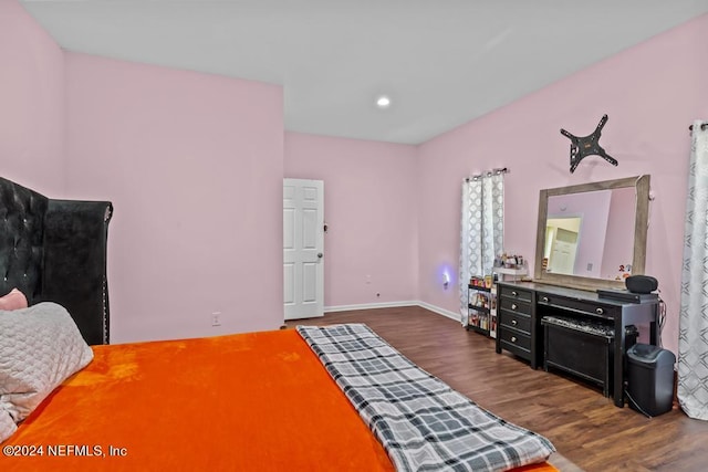 bedroom featuring dark hardwood / wood-style floors