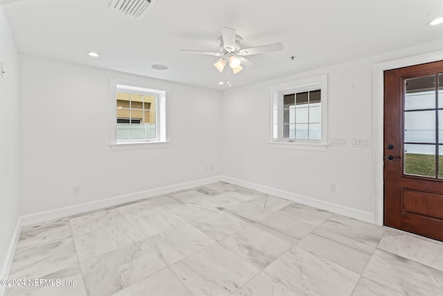 empty room featuring ceiling fan