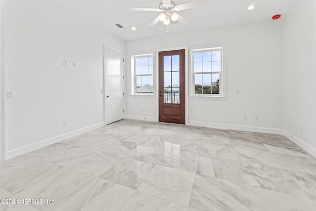 foyer with ceiling fan