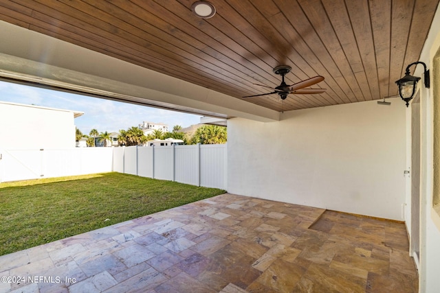 view of patio featuring ceiling fan