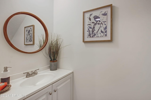 bathroom with vanity with extensive cabinet space