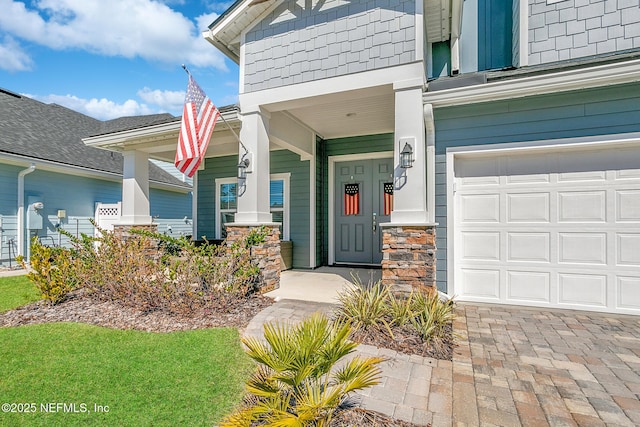 entrance to property with stone siding