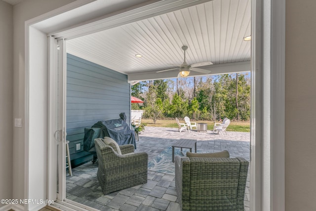 view of patio with a ceiling fan