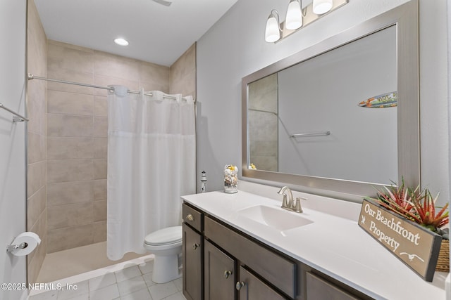 full bathroom with toilet, recessed lighting, tiled shower, tile patterned floors, and vanity