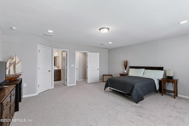 bedroom featuring recessed lighting, visible vents, light carpet, and baseboards