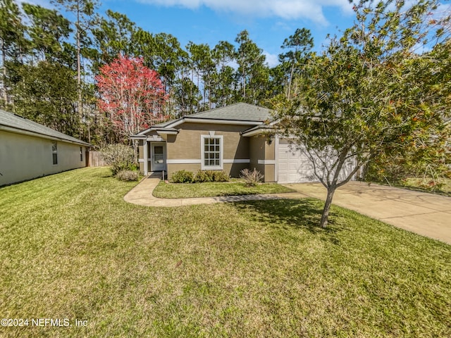 view of front of home with stucco siding, a shingled roof, a garage, driveway, and a front lawn