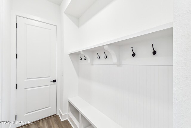 mudroom with hardwood / wood-style flooring