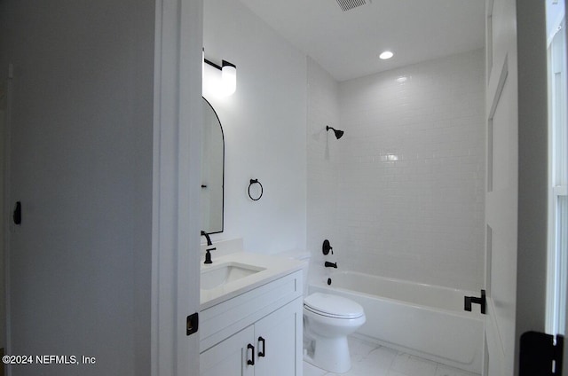 full bathroom featuring vanity, toilet, and tiled shower / bath combo