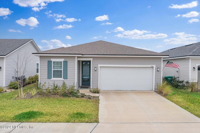 ranch-style house featuring a front lawn