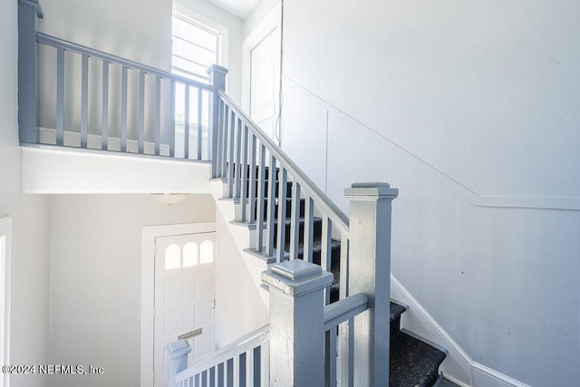 stairway with a high ceiling