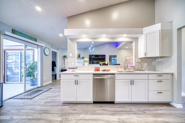 kitchen featuring white cabinetry, sink, light wood-type flooring, a textured ceiling, and dishwasher