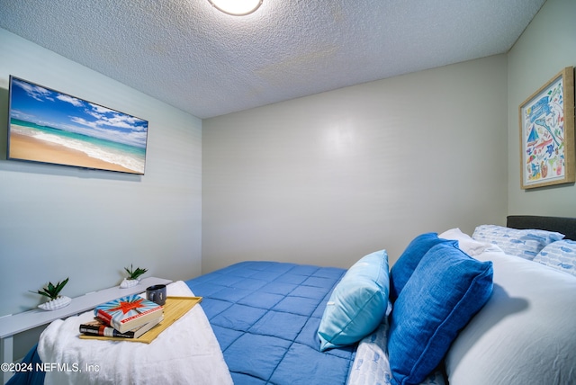 bedroom with a textured ceiling