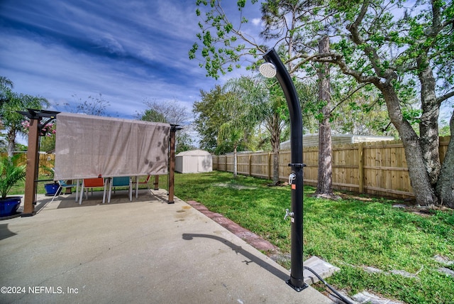 view of patio / terrace with a storage unit