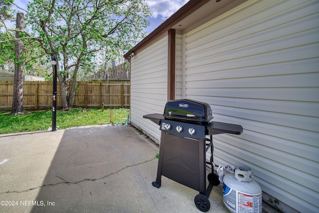 view of patio featuring a grill