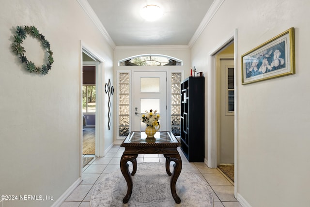 entryway featuring crown molding and light tile flooring