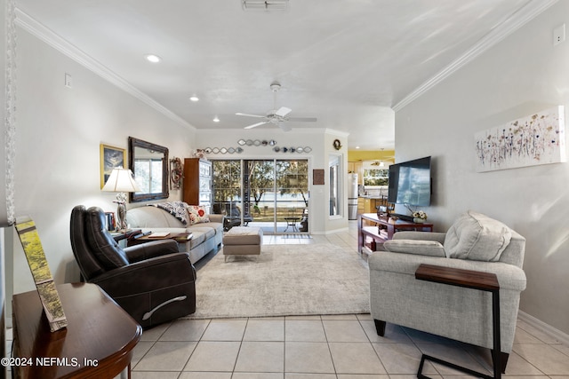 living room with ceiling fan, light tile flooring, and ornamental molding